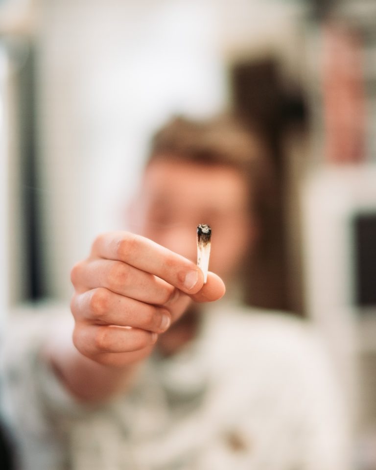 Man holding marijuana